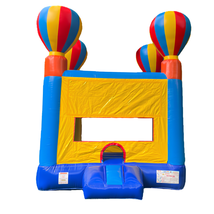 Colorful inflatable bounce house with hot air balloon designs on a white background