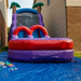 15_Lightweight Purple Reign Slide with blower between 2 houses with blue tarp. Low angle pic.