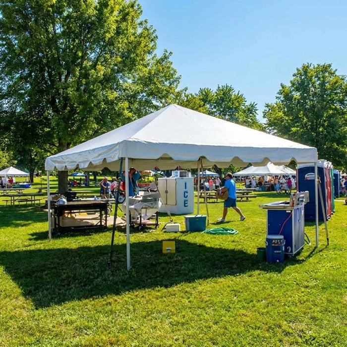 Beyond Tent White 15x20  with people and outdoor furniture in a park setting