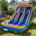 Beyond Tent 18' Double Lane Splash Wet and Dry Slide set up in a backyard next to a wood deck with patio furniture, houses visible in the background