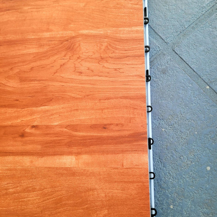 Beyond Tent 1'x2' Event Subfloor - Commercial Grade deploy in a warehouse with a Dance floor on top. Showing how the product is use.