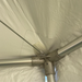 Close-up interior view of the 20x20 Hexagon High Peak Frame Tent's aluminum center hub, showing multiple frame tube connections and a diagonal cross-cable labeled 'A' for assembly reference, with the white vinyl canopy overhead.