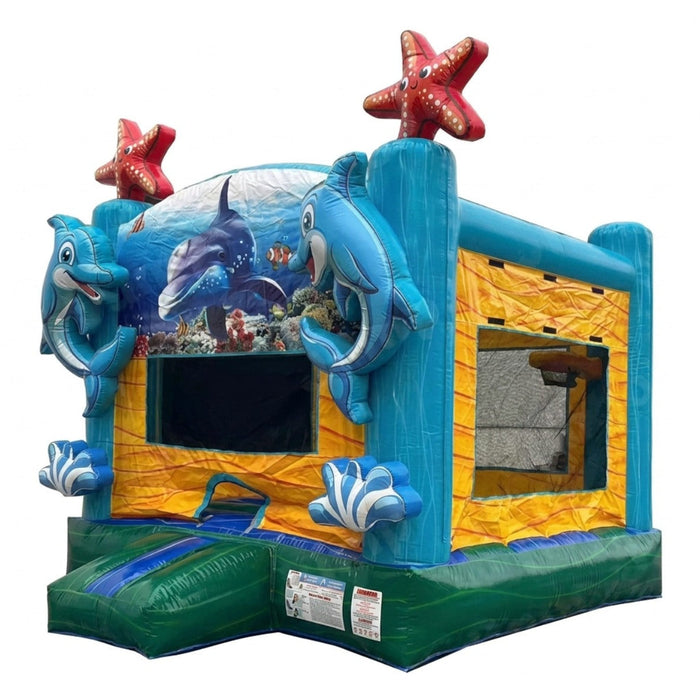 Beyond Tent Atlantis Inflatable Castle 13x13 Commercial Inflatable, teal and yellow ocean-themed bounce house with dolphin and starfish graphics, angled studio view on white background