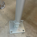 Heavy-duty aluminum base plate for West Coast Style frame tent legs with hitch pin securement.