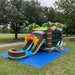 Beyond Tent Dino Stampede Bounce House Combo Wet & Dry set up on grass in a park setting with picnic tables and mature trees in the background