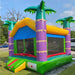 Beyond Tent Lightweight Palm Tree Bouncer angled view set up on grass near a street, parked cars and van visible, clear blue sky