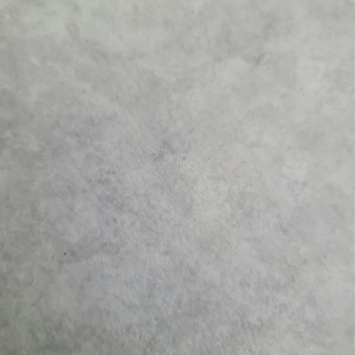Natural_Grey_Vinyl_Flooring_CommercialGrade_2slightly mottled fabric or material surface.
