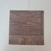 Rustic Oak vinyl flooring plank sample on a white background, showing the brown wood-look grain pattern and two plank seams