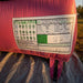 Safety rules label on Tropical Castle Bounce House tube showing ASTM compliance and operator guidelines