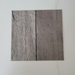 Beyond Tent Silver Oak commercial-grade vinyl flooring tile sample, wood-grain texture in muted gray tones, top-down view on white background