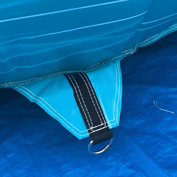 Beyond Tent Solar Dual Lane Combo close-up of a webbing strap and D-ring stake anchor point on teal vinyl, set on a blue ground tarp