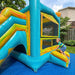 Beyond Tent Solar Dual Lane Combo bounce and climb entry area with mesh safety windows, teal and yellow marbled vinyl, child climbing into the unit in a backyard with wood fence