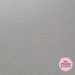 A close-up texture of the solid grey roller vinyl material with a subtle pebbled or brushed finish, featuring a pink circular badge in the bottom right corner that reads 'VINYL APPEARANCE IN CLOSE-UP'.