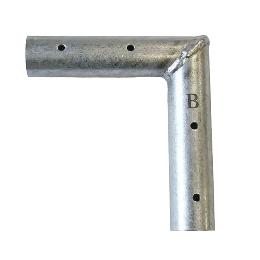 West Coast Frame Tent 2-Way Flat Tee Fitting featuring a welded corner and a stamped letter 'B' on the vertical leg, displayed on a white textured fabric background.