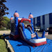 Side view from the slide end of the American Titan Wet and Dry Combo, splash pool with American flags, red, white and blue marble vinyl, star towers, on a tarp in a commercial lot