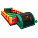 Side view of a commercial inflatable human foosball arena on a white background, highlighting the integrated black safety netting enclosure, green vinyl walls, and side blower tube attachment.
