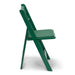 Green resin folding chair, side profile view in the open position on white background
